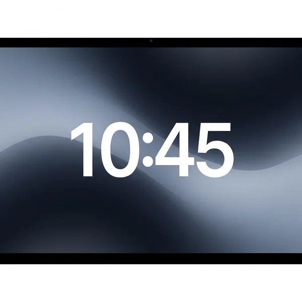 A large, clear digital clock on a monitor for focus.